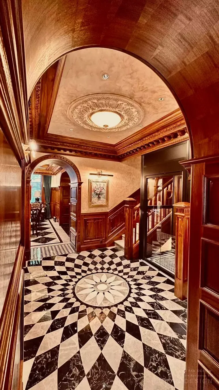 Entrance hall with black and white stone floor