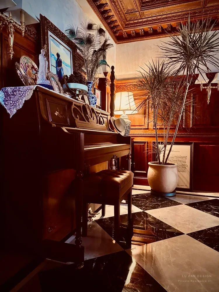 Piano, teak woodwork and collected objects in a warm living space